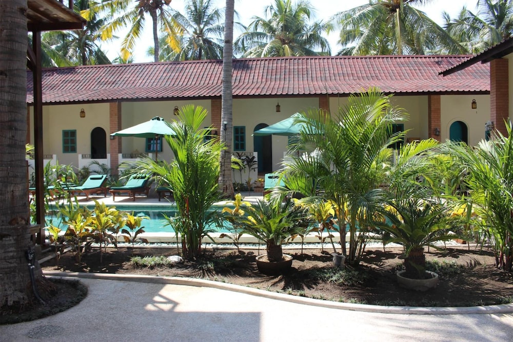 White Coconut Cottage